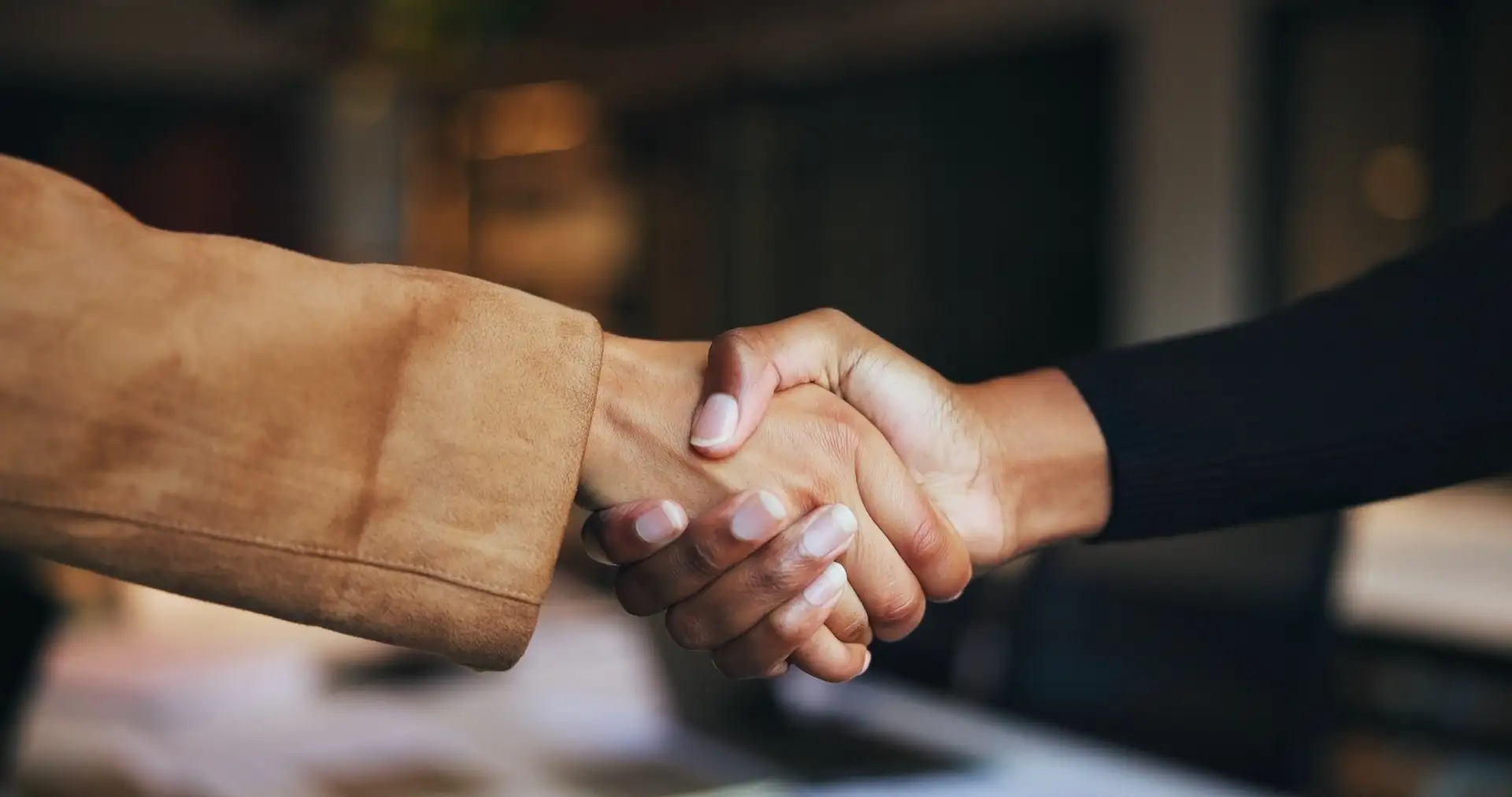 Close-up of two people shaking hands