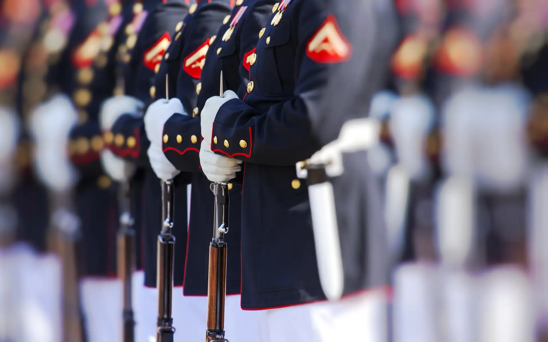Military honor guard standing at attention in dress uniform